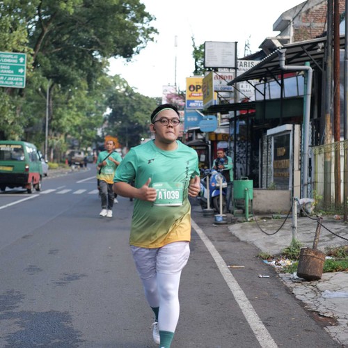 Race photo from BAUR RUN 2025
