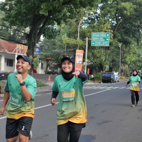 Race photo from BAUR RUN 2025