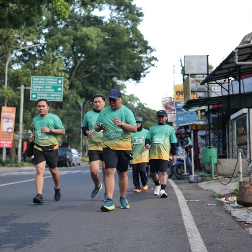 Race photo from BAUR RUN 2025