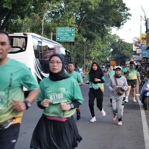 Race photo from BAUR RUN 2025