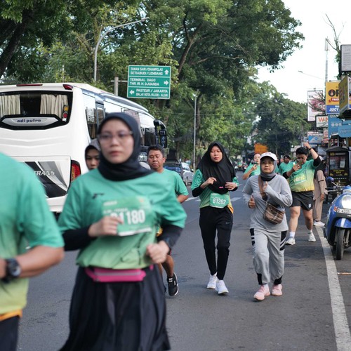 Race photo from BAUR RUN 2025