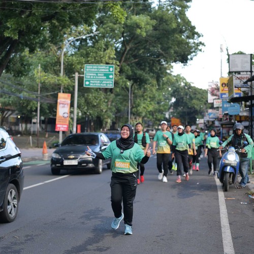 Race photo from BAUR RUN 2025