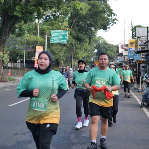 Race photo from BAUR RUN 2025