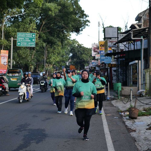 Race photo from BAUR RUN 2025