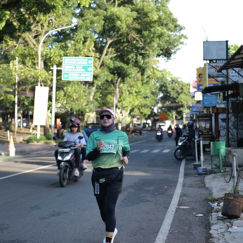 Race photo from BAUR RUN 2025