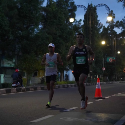 Race photo from BAUR RUN 2025