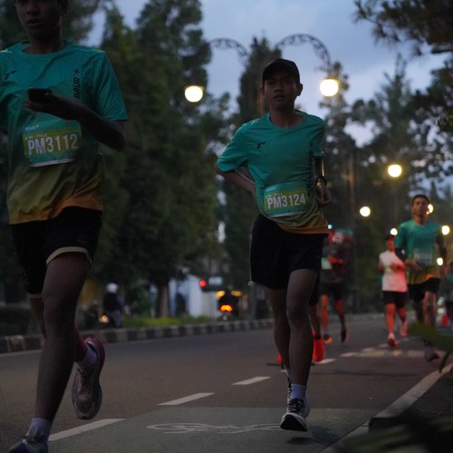 Race photo from BAUR RUN 2025