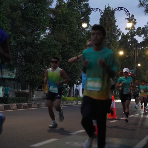 Race photo from BAUR RUN 2025
