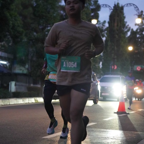 Race photo from BAUR RUN 2025