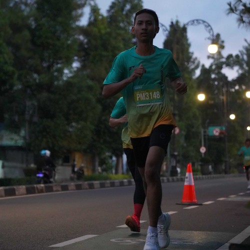 Race photo from BAUR RUN 2025
