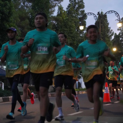 Race photo from BAUR RUN 2025