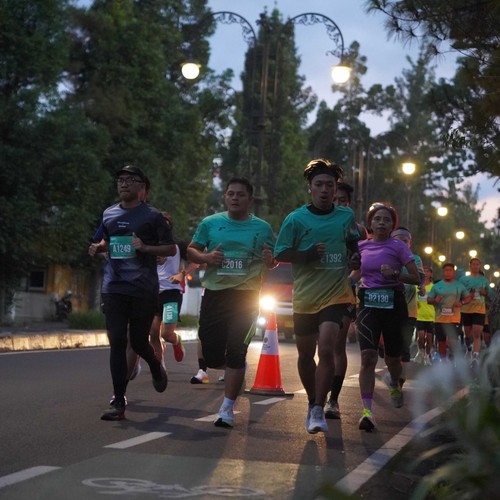Race photo from BAUR RUN 2025