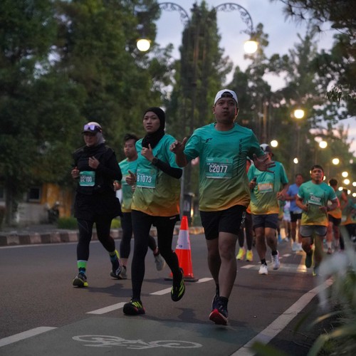 Race photo from BAUR RUN 2025