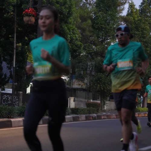 Race photo from BAUR RUN 2025