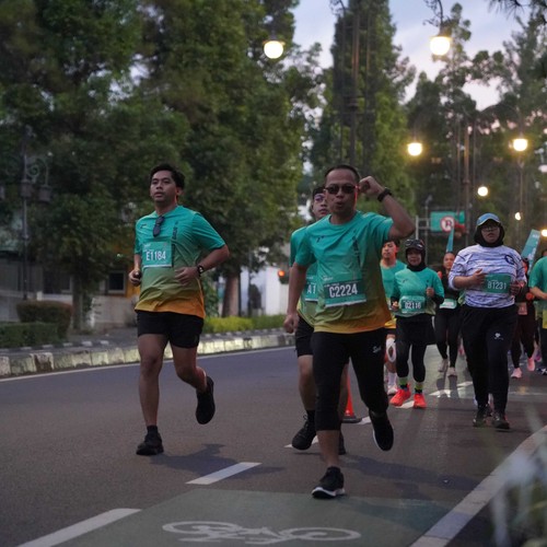Race photo from BAUR RUN 2025