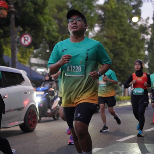 Race photo from BAUR RUN 2025