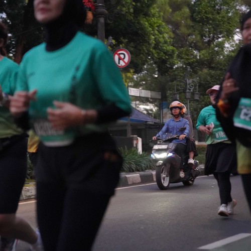 Race photo from BAUR RUN 2025