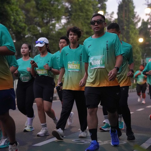 Race photo from BAUR RUN 2025