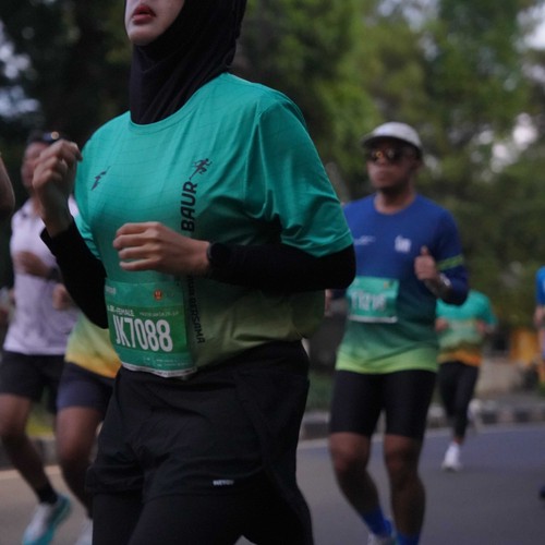 Race photo from BAUR RUN 2025