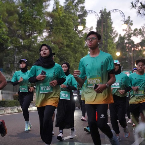 Race photo from BAUR RUN 2025