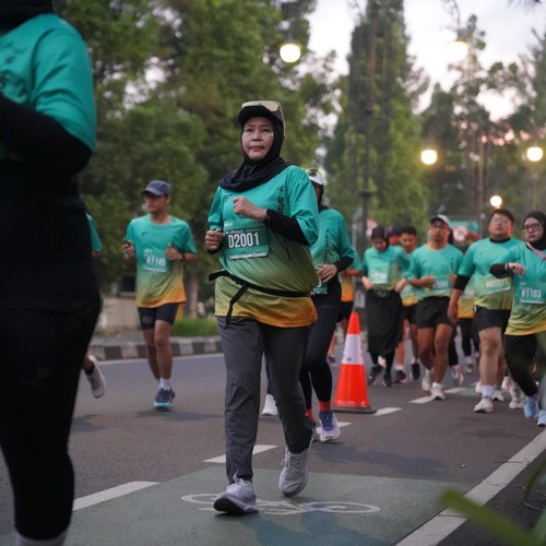 Race photo from BAUR RUN 2025