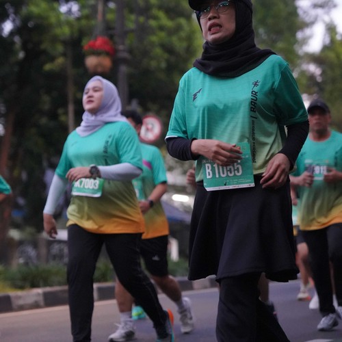 Race photo from BAUR RUN 2025