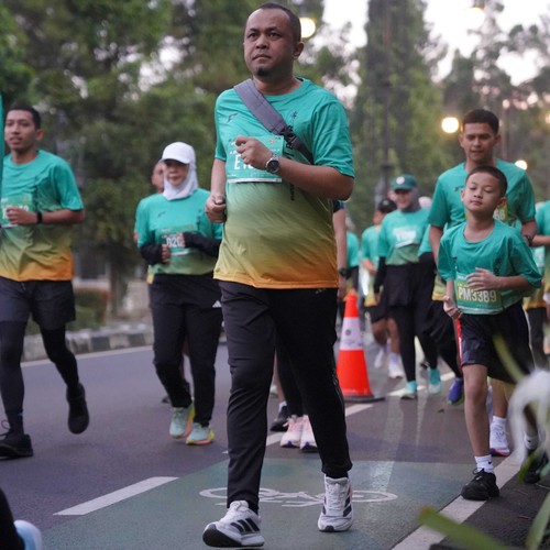 Race photo from BAUR RUN 2025