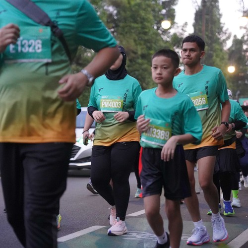 Race photo from BAUR RUN 2025