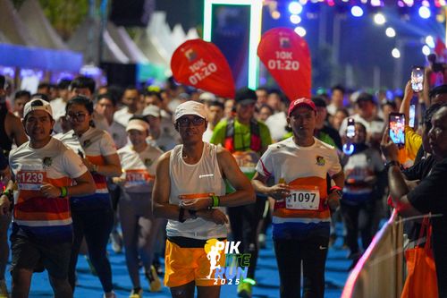 Race photo from PIK NITE RUN 2025
