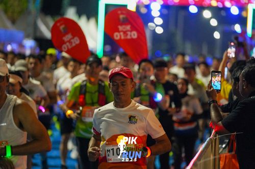 Race photo from PIK NITE RUN 2025