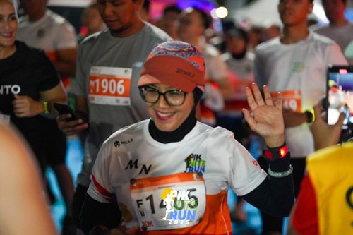 Race photo from PIK NITE RUN 2025