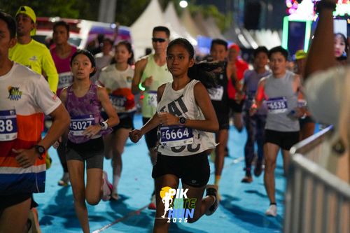 Race photo from PIK NITE RUN 2025