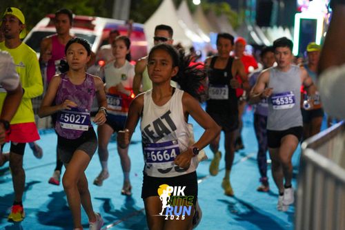 Race photo from PIK NITE RUN 2025