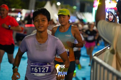 Race photo from PIK NITE RUN 2025