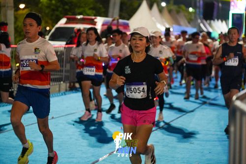 Race photo from PIK NITE RUN 2025
