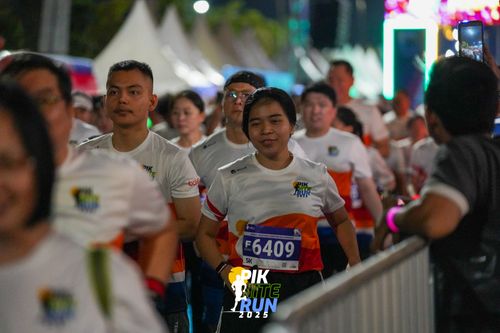 Race photo from PIK NITE RUN 2025