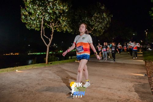Race photo from PIK NITE RUN 2025