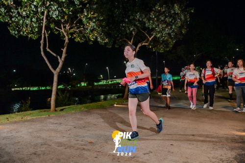 Race photo from PIK NITE RUN 2025