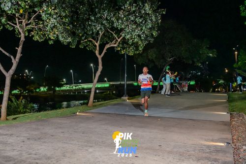 Race photo from PIK NITE RUN 2025