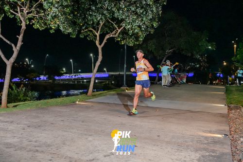 Race photo from PIK NITE RUN 2025