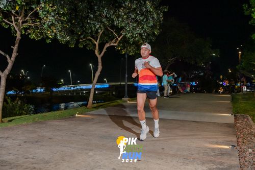 Race photo from PIK NITE RUN 2025