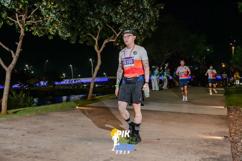 Race photo from PIK NITE RUN 2025