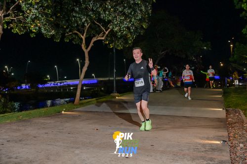 Race photo from PIK NITE RUN 2025