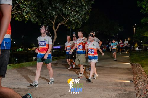 Race photo from PIK NITE RUN 2025