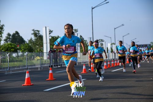 Race photo from PIK NITE RUN 2025
