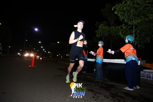 Race photo from PIK NITE RUN 2025