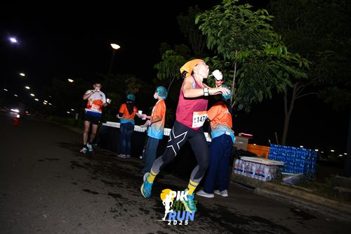 Race photo from PIK NITE RUN 2025