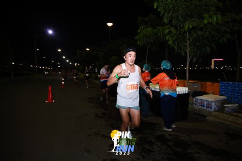 Race photo from PIK NITE RUN 2025