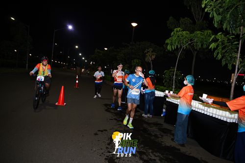 Race photo from PIK NITE RUN 2025