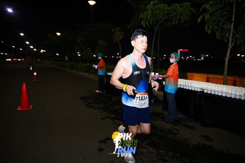 Race photo from PIK NITE RUN 2025